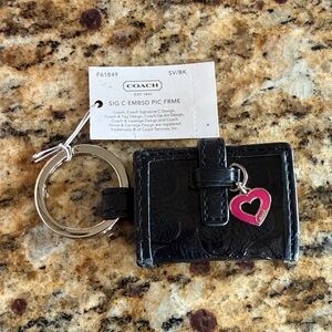 Coach Black Signature Embossed Mini Frame Keychain with Pink Heart Charm